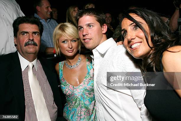Mike Helton, President of NASCAR, socialite Paris Hilton, driver Denny Hamlin and Gillian Zucker, President California Speedway attend the California...