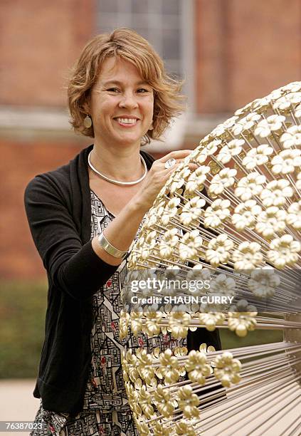 Artist Sofie Layton poses with her art installation in Kensington Palace gardens, in central London, 30 August 2007, to mark the 10th anniversary of...