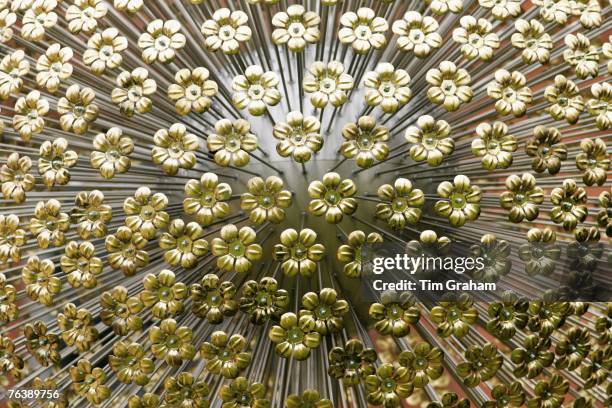 Detail of one of the ten eleven feet tall statues of dandelion seed heads created by artist Sophie Layton in the 'Field of Flowers' installation at...