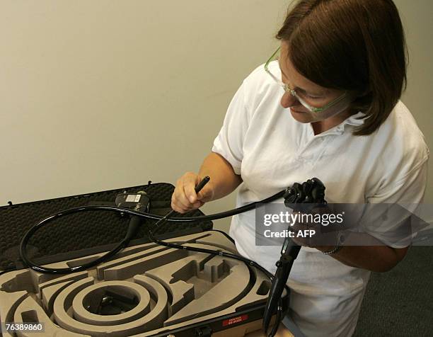 An house doctor in the Berthoven hospital in Oss, 30 August 2007 shows tubes used for exploratory surgery of the stomach, lungs and intestines, that...