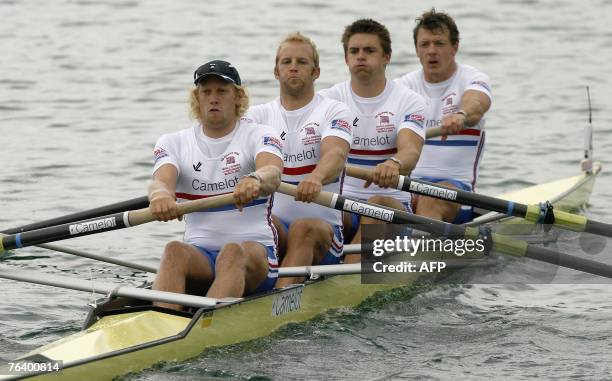 Steve Williams, Peter Reed, Alex Partridge and Andrew Triggs Hodge of Britain compete in the men's coxless four semi-final race of the Rowing World...