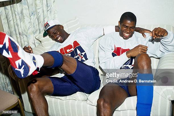 Michael Jordan and Magic Johnson of the United States Basketball Team share a laugh during the 1992 Olympics in Barcelona, Spain. NOTE TO USER: User...