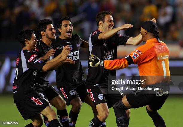 Edy Brambila, Rafael Marquez Lugo, Jaime Correa and Luis Gabriel Rey of Pachuca celebrate with goalkeeper Miguel Calero of Pachuca after they...