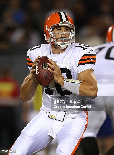 Brady Quinn of the Cleveland Browns looks for a receiver against the Chicago Bears in a preseason game at Soldier Field August 30, 2007 in Chicago,...