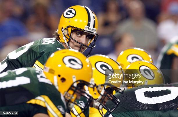 Aaron Rodgers of the Green Bay Packers awaits the snap against the Tennessee Titans during a preseason game on August 30, 2007 at LP Field in...