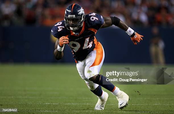 Jarvis Moss the Denver Broncos comes off the line of scrimmage against the Arizona Cardinals during NFL preseason action at Invesco Field August 30,...