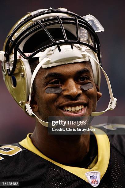 Wide receiver Marques Colston of the New Orleans Saints smiles as he walks off the field after defeating the Miami Dolphins on August 30, 2007 at the...