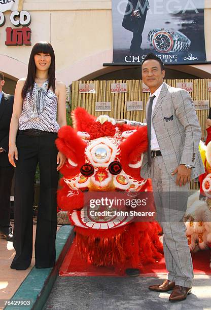 Qi Qi, OMEGA Ambassador and Simon Yam, OMEGA Ambassador