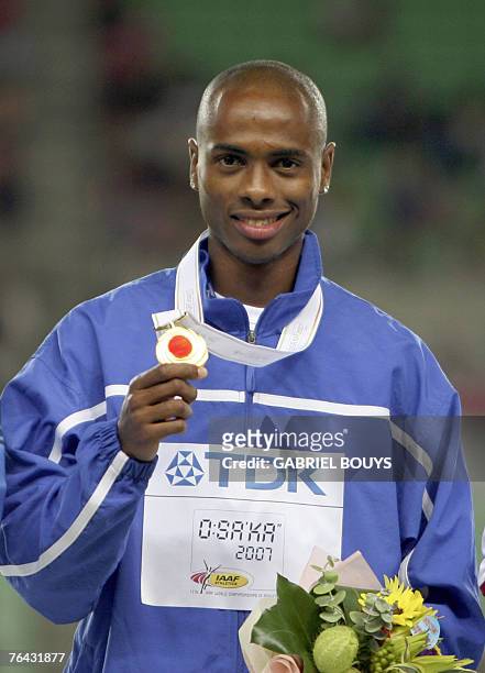 Panama's gold medalist Irving Saladino poses during the men's long jump medal ceremony, 31 August 2007, at the 11th IAAF World Athletics...