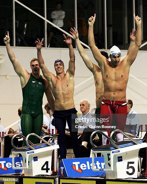 Kenrick Monk, Grant Brits, Kirk Palmer and Grant Hackett of Australia celebrate after breaking the world record for the men's shortcourse 4 x 200m...