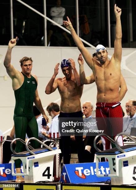 Kenrick Monk, Grant Brits, Kirk Palmer and Grant Hackett of Australia celebrate after breaking the world record for the men's shortcourse 4 x 200m...