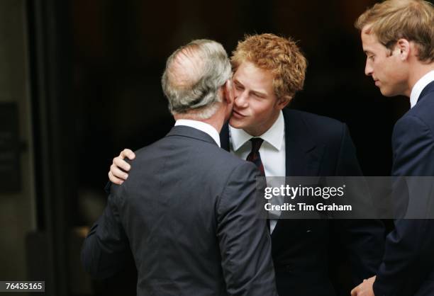 Prince Harry greets his father Prince Charles, Prince of Wales at the 10th Anniversary Memorial Service For Diana, Princess of Wales at Guards Chapel...