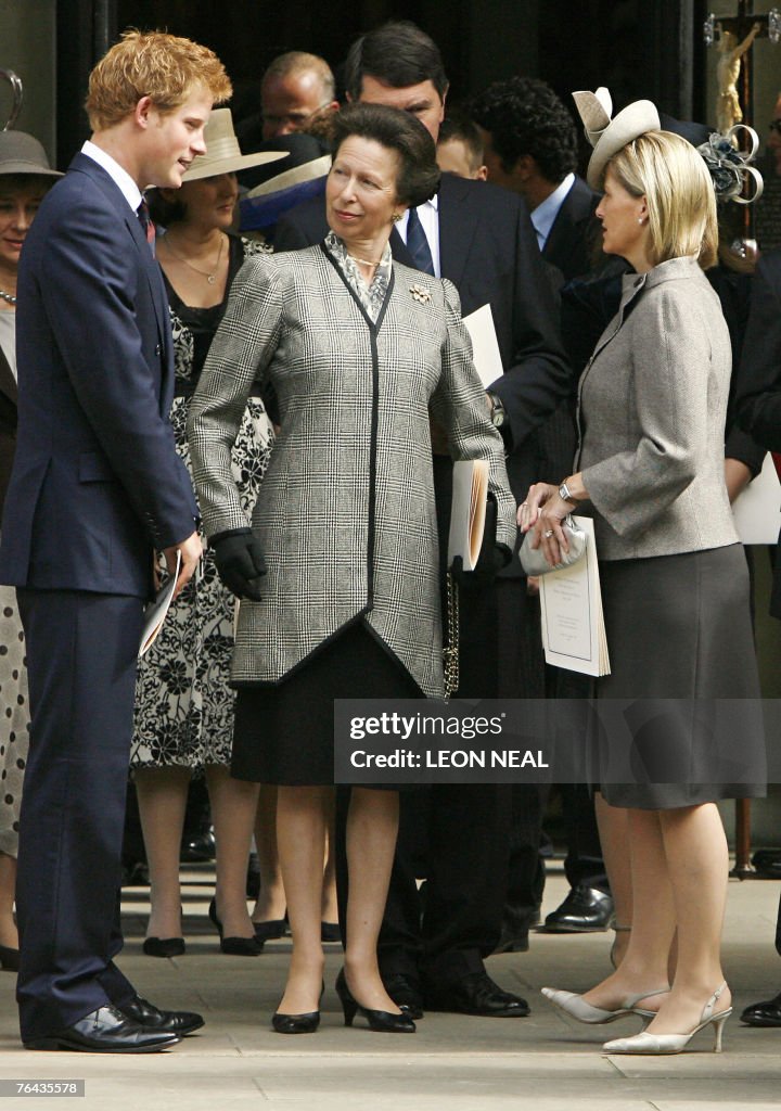 Britain's Princess Anne (C) speaks with