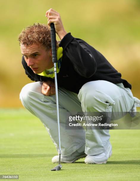 Joost Luiten of The Netherlands lines up his putt on the first hole during the second round of The Johnnie Walker Championship on The PGA Centenary...