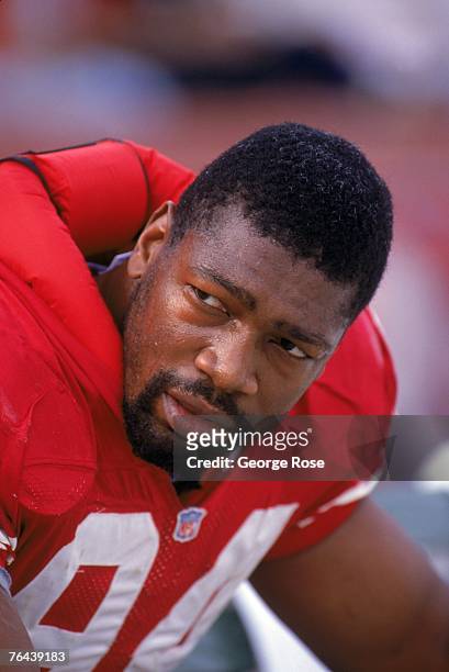 Defensive ends Charles Haley of the San Francisco 49ers takes a rest on the bench during a game against the New Orleans Saints at Candlestick Park on...