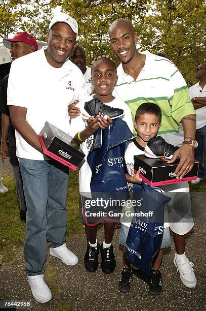 Gospel Singer and Pastor Donnie McClurkin and Pro Basketball Player Stephon Marbury with Aaron Jean and John Nunez at The New York Call and Youth...