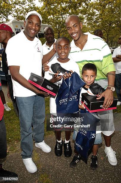 Gospel Singer and Pastor Donnie McClurkin and Pro Basketball Player Stephon Marbury with Aaron Jean and John Nunez at The New York Call and Youth...