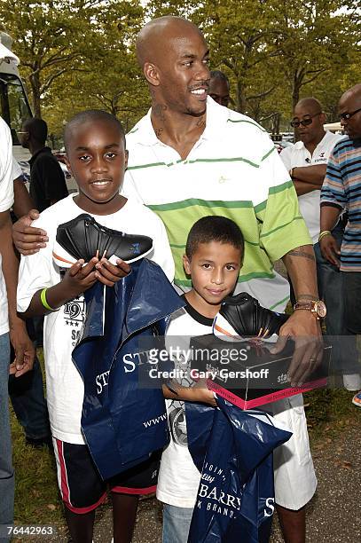 Pro Basketball Player Stephon Marbury with Aaron Jean and John Nunez at The New York Call and Youth Xplosion - Starbury Giveback Day on August 31,...