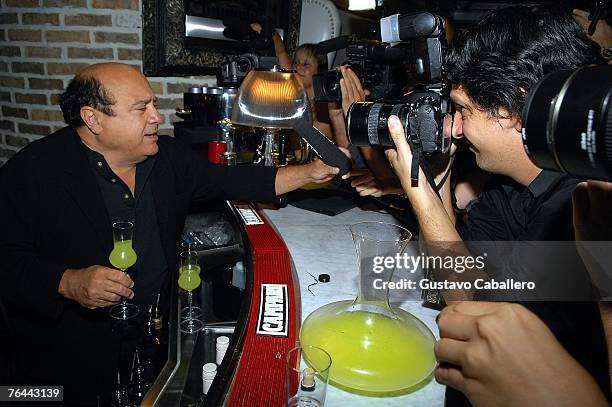 Actor Danny Devito tends bar at his restaurant DeVito South Beach where he launched his Limoncello brand liquor August 31, 2007 in Miami Beach,...