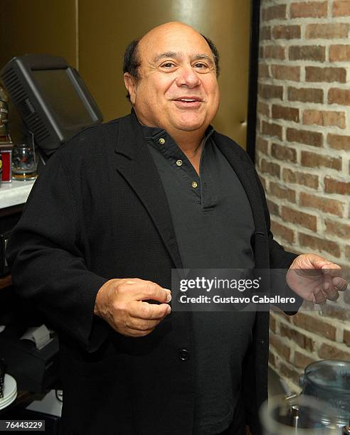 Actor Danny Devito tends bar at his restaurant DeVito South Beach where he launched his Limoncello brand liquor August 31, 2007 in Miami Beach,...