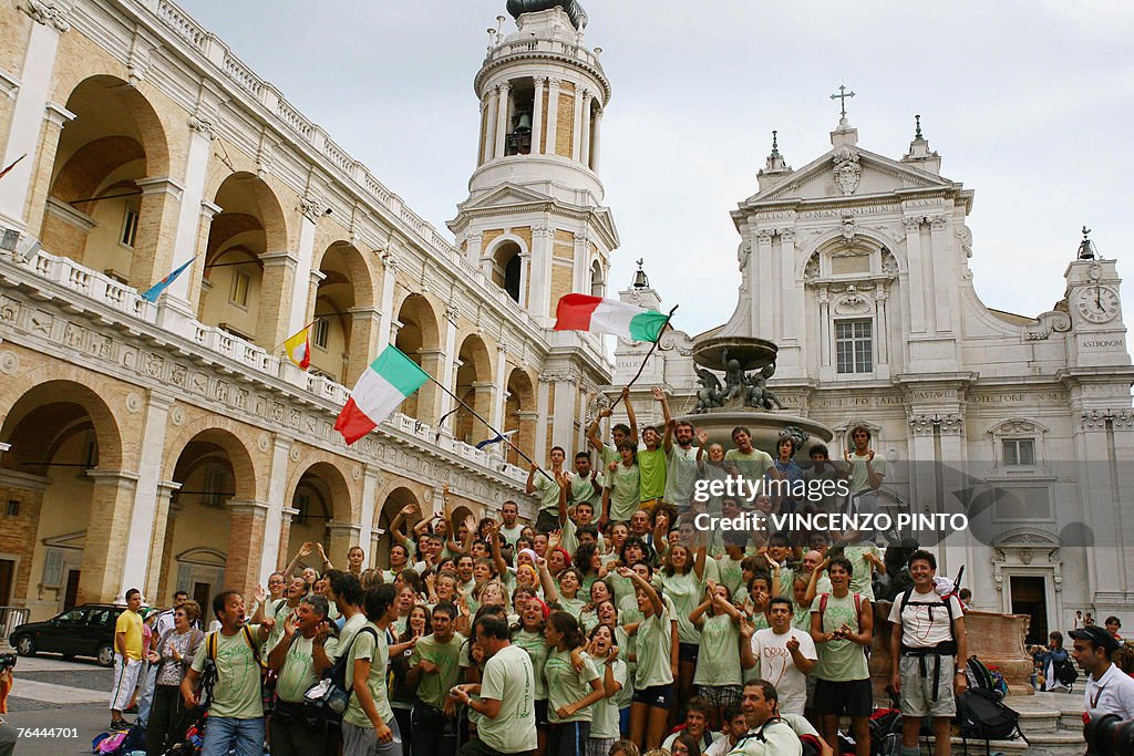 People cheer as they arrive on the squar