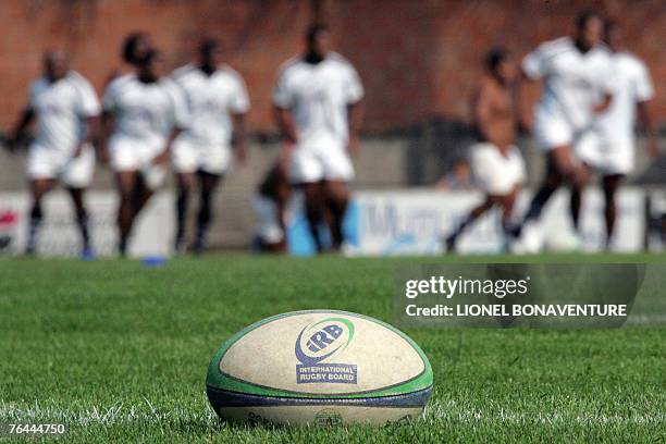 Ball is pictured in front of the Fijian rugby union national attending a training session, 31 August 2007 at the Jo Carabignac stadium in Moissac,...