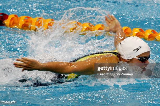 Libby Lenton of Australia swims in the semi final of the women's 100m butterfly during day four of the 2007 Australian Short Course Swimming...