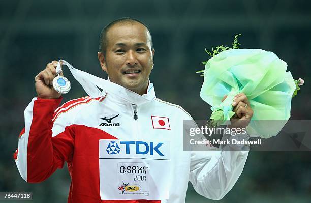 Silver medalist Soejima Masazumi receives his medal for the Men's 1500m Wheelchair race on day eight of the 11th IAAF World Athletics Championships...