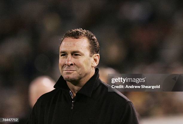 Cronulla Sutherland coach Ricky Stuart smiles during the round 25 NRL match between the Canberra Raiders and the Cronulla-Sutherland Sharks at...