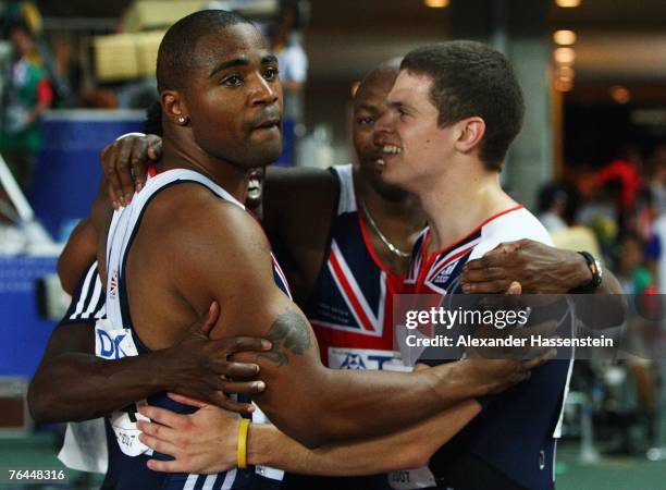 Mark Lewis-Francis of Great Britain celebrates winning the bronze medal with teammates Christian Malcolm, Marlon Devonish and Craig Pickering after...