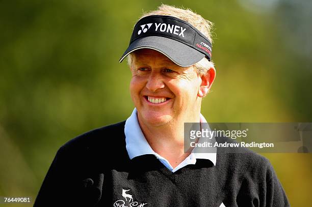 Colin Montgomerie of Scotland smiles during the third round of The Johnnie Walker Championship on The PGA Centenary Course at Gleneagles on September...