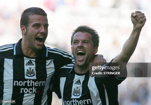 Newcastle United's Michael Owen celebrates his second half goal against Wigan Athletic with teammate Steven Taylor in their Barclays Premiership...