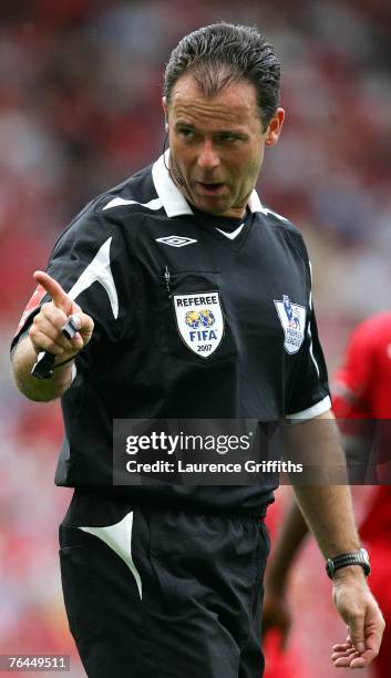 Referee Rob Styles gestures during the Barclays Premier League match between Middlesbrough and Birmingham City at the Riverside Stadium on September...