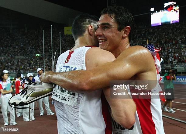 Pole Vault gold medalist Brad Walker of the United States of America is congratulated by decathlete Robert Jacob Arnold of the United States of...