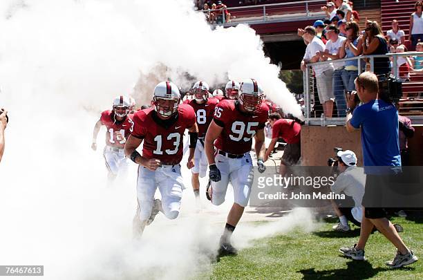 Led by starting quarterback T.C. Ostrander and defensive lineman Chris Horn, the Stanford Cardinal take the field before the UCLA Bruins 45-17 defeat...