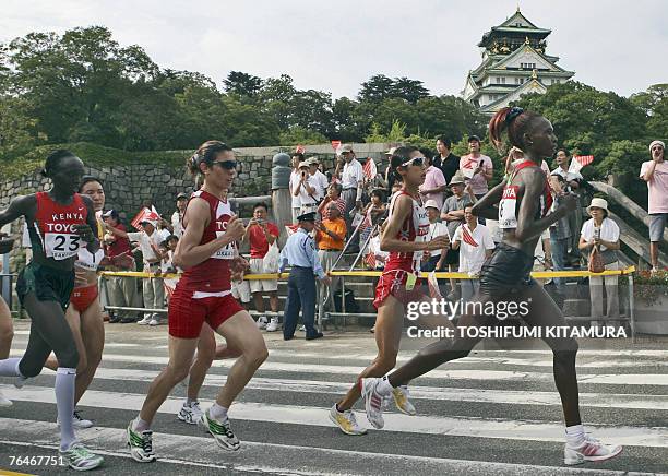 Women MArathon athletes Kenya Rose Cheruiyot, Chinese Chunxiu Zhou, Algerian Souad Ait Salem, Japanese Reiko Tosa and Kenyan Rita Jeptoo Sitienei run...
