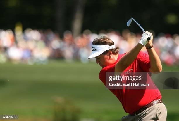 Phil Mickelson watches his approach shot on the fifth hole during the second round of the Deutsche Bank Championship, the second event of the new PGA...