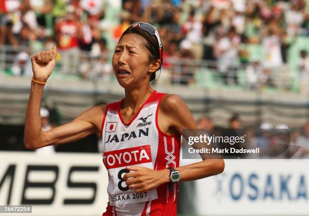 Reiko Tosa of Japan celebrates finishing in third place in the Women's Marathon on day nine of the 11th IAAF World Athletics Championships on...