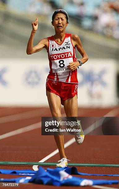 Reiko Tosa of Japan celebrates finishing in third place in the Women's Marathon on day nine of the 11th IAAF World Athletics Championships on...