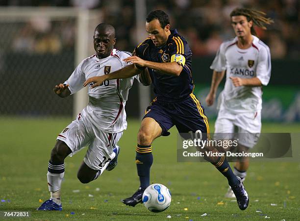 Jean-Martial Kipre of Real Salt Lake challenges Landon Donovan of the Los Angeles Galaxy in the second half during their MLS match at the Home Depot...