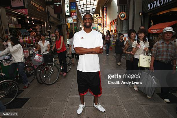 Tyson Gay of the United States of America poses for photographers on the streets of Osaka during a photocall on day nine of the 11th IAAF World...