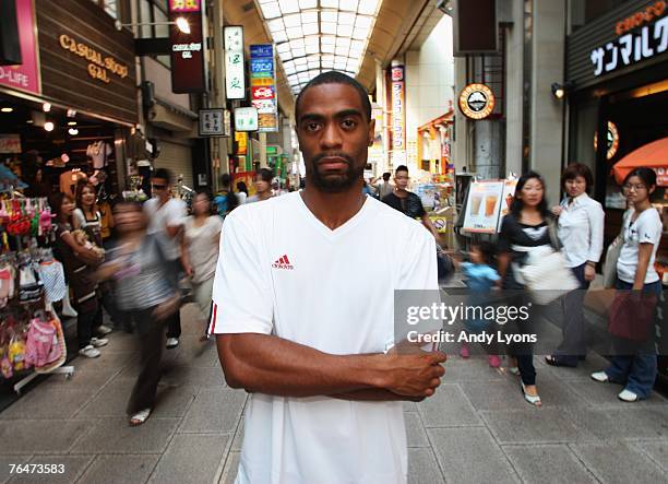 Tyson Gay of the United States of America poses for photographers on the streets of Osaka during a photocall on day nine of the 11th IAAF World...