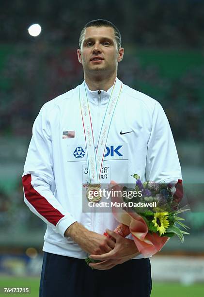 Brad Walker of the United States of America receives his gold medal for winning the Men's Pole Vault Final on day nine of the 11th IAAF World...