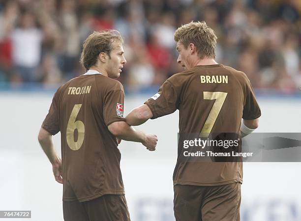 Marvin Braun and Filip Trojan of St Pauli are seen after Trojans first goal during the 2. Bundesliga match between SpVgg Greuther Fuerth and FC St....