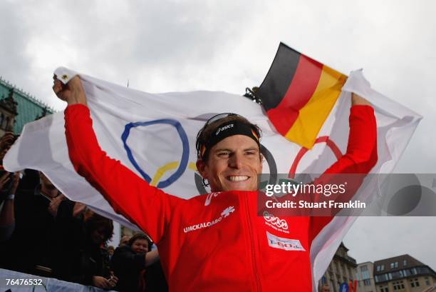 Daniel Unger of Germany celebrates winning the Triathlon World Championships on September 2, 2007 in Hamburg, Germany.