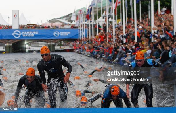 The athletes leave the water during the Triathlon World Championships on September 2, 2007 in Hamburg, Germany.