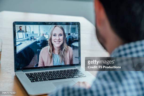 business people on video conference - voip stock pictures, royalty-free photos & images