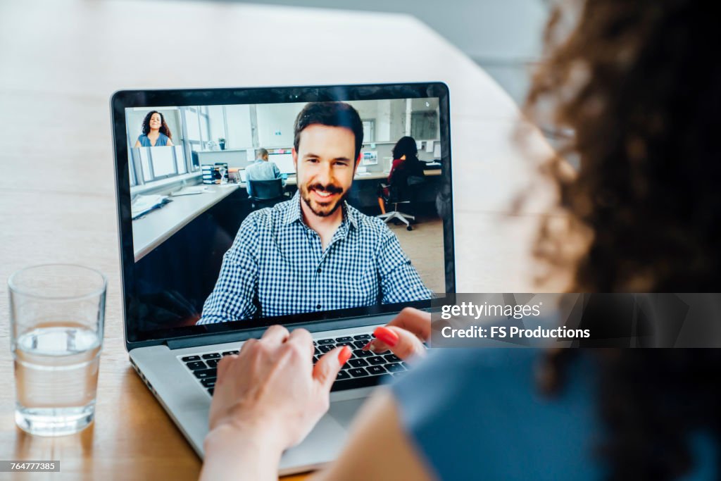 Business people on video conference