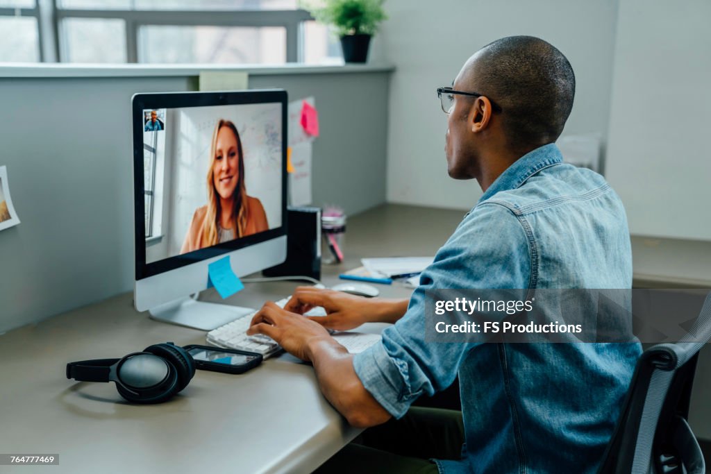 Business people on video conference