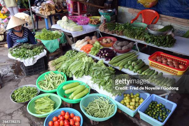 fresh vegetables at market stall. vietnam. - vietnam market stock pictures, royalty-free photos & images
